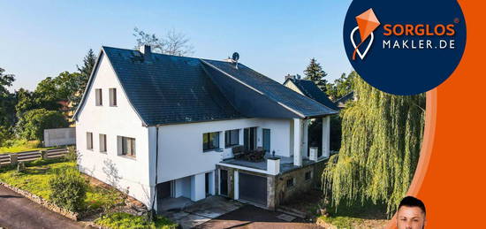 Mitten im Grünen - Einfamilienhaus mit viel Platz und Potenzial für Ihre Wohnträume !