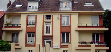 Appartement 2 chambres, jardin commun