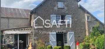 Maison en pierre de 132 m² dans le centre de Saint-Ellier-les-bois