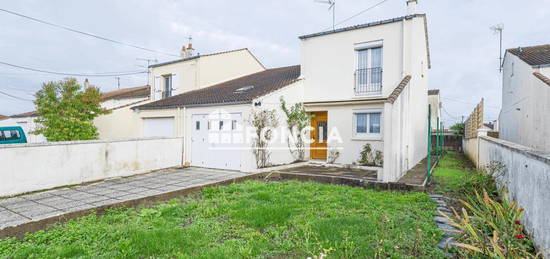 Maison avec garage et jardin