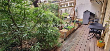 APPARTEMENT AVEC JARDIN