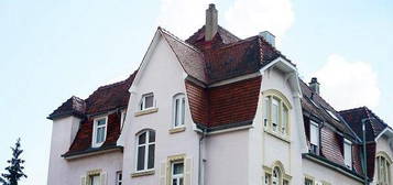 Mehrfamilienhaus mit Carport