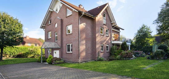 Erdgeschosswohnung mit hellem Souterrain, Terrasse und Garten in Top-Lage von Reinbek-Schönningstedt