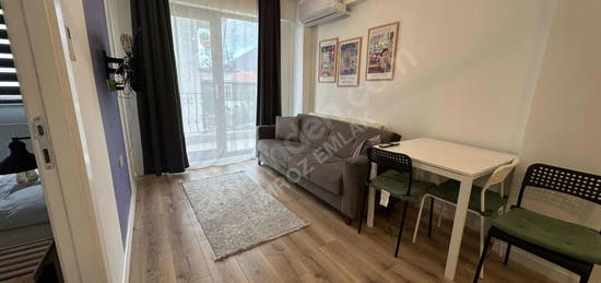 İMROZ EMLAK'TAN DTRK 5. ETAPTA FULL EŞYALI SATILIK 1+1 DAİRE