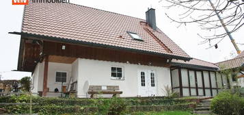 Einfamilienhaus mit Garage und großem Grundstück und eigenem Wald