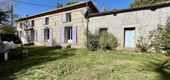 Maison en pierre avec dépendance sur jardin arboré