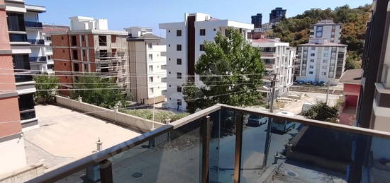 TRUVA'DAN KÖRFEZ'DE 1+1 SIFIR DAİRE