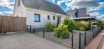 Westerrönfeld | Modernisiertes Einfamilienhaus mit viel Platz und sonnigem Garten in familiärer Lage