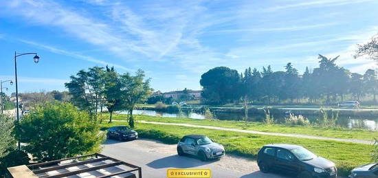 STUDIO MEZZANINE AU BORD DU CANAL AIGUES-MORTES