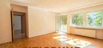 Bogenhausen/Oberföhring - Familienfreundliche 4-Zimmer-Wohnung mit Sonnenbalkon &amp; Blick ins Grüne