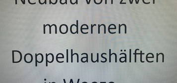 Neubau von zwei modernen Doppelhaushälften