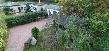 Charmanter Bungalow mit Stil und Potenzial für Handwerker mit Nebengebäude in Ahlhorn - Ruhiges Wohnen am Wald