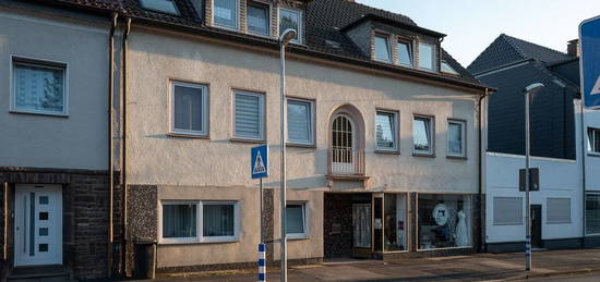 Mehrfamilienhaus mit Ladenlokal in zentraler Lage