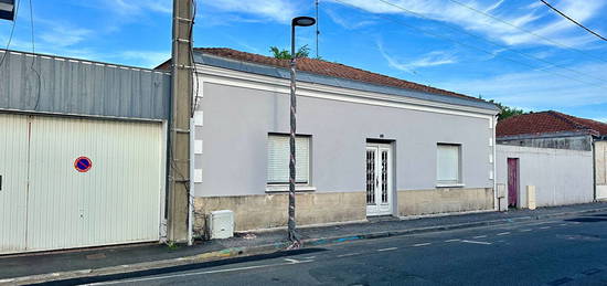 Maison des années 60 à rénover avec jardin au coeur de ville