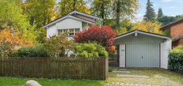 Deisenhofen: Wunderschönes Einfamilienhaus mit Hanglage und großem Garten