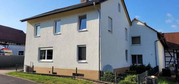 ***RESERVIERT*** Vierfamilienhaus mit fünf Garagen und großem Grundstück