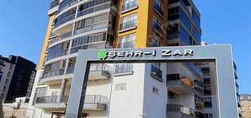 KEPEZ HAMİDİYE'DE ŞEHRİZAR EVLERİNDE HAVUZLU 2+1 SATILIK DAİRE