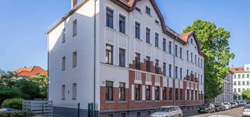 Attraktives Altbau-Investment: Vermietete 2-Zimmer-Wohnung mit Süd-Balkon