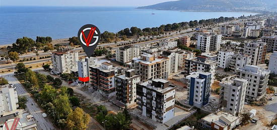 İSKANLI VE KAT MÜLKİYETLİ DENİZE SIFIR 51 m2 SATILIK 1+1 DAİRE