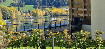 Pure Wohnfreude mit kleinem Garten und Seeblick in Zell am See zu kaufen!