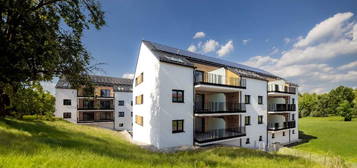 Lichtdurchflutete 4-Zimmer-Wohnung mit Grünblick - Neubau mit DAN-Küche & Terrasse