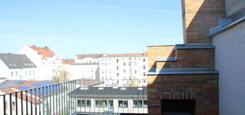 3 Raumdachgeschosswohnung mit Terrasse und Außenkamin