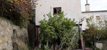 Casa adosada en calle Arraíces en Alpujarra de la Sierra