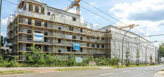 Wohnen am Wasser + schnell in der City: 2-Zi.-Wohnung mit Terrasse und großem Garten