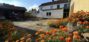 Landleben pur: Einfamilienhaus mit Stallungen, Garten und großem Grundstück in Schköna