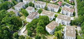 Moderne 4 Zimmer Wohnung mit großer Terrasse und kleinem Garten mitten im Park ERSTBEZUG