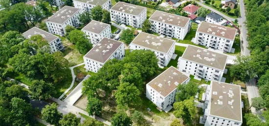 Moderne 4 Zimmer Wohnung mit großer Terrasse und kleinem Garten mitten im Park ERSTBEZUG