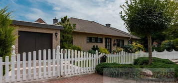 Charmanter Bungalow mit Garage und tollem kleinen Garten