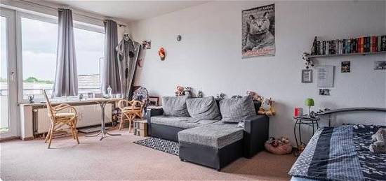 Vermietete 1-Zimmer-Wohnung mit Balkon und Parkplatz in Norderstedt: Kapitalanlage mit guter Rendite