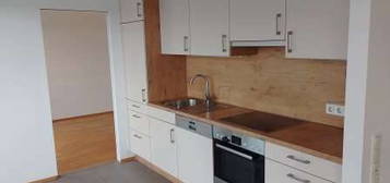 Freundliche 2-Zimmer-Neubau-Wohnung 58 m² mit Balkon und begehb. Schrank, TG optional