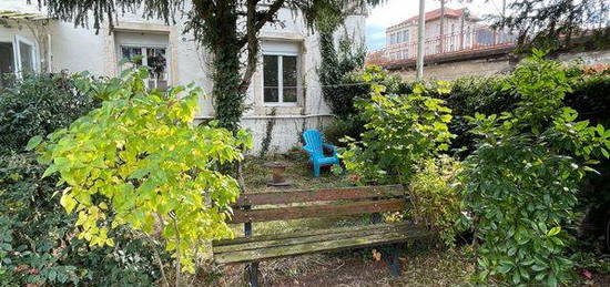 NANCY - Rue de Nabécor : Charmant appartement avec jardin