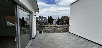 Riesige Dachterrasse und Erstbezug: Moderne 2-Zimmer-Wohnung in TOP-Wohnlage von Bardenberg!