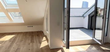 Neubau DG-Wohnung mit Dachterrasse in Toplage