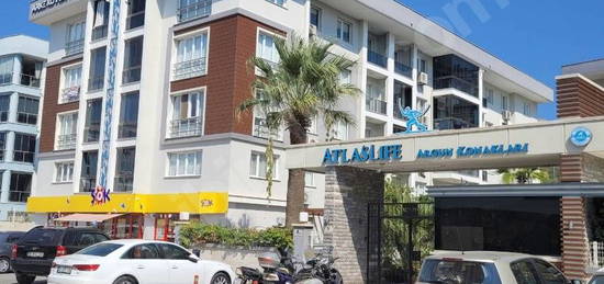 KUSADASI OTOGAR ARKASI 2+1 FUL ESYALI HAVUZLU GUVENLIKLI KIRALIK