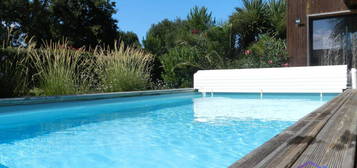 Maison T4 ossature bois 99m² piscine chauffée, garage, jardin