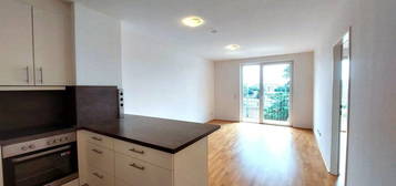 Top 2 Zimmerwohnung mit Balkon nahe Millenium City