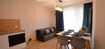 Nowy, nieużywany apartament z ogródkiem. Garaż