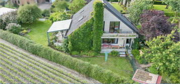 Harmonisches Einfamilienhaus in Siedlungsrandlage mit Blick ins Grüne!