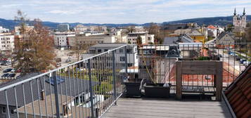 Dochgeschoßwohnung in der Innenstadt