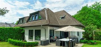 Family paradise - semi-detached house with garden and garages | WAGNER IMMOBILIEN