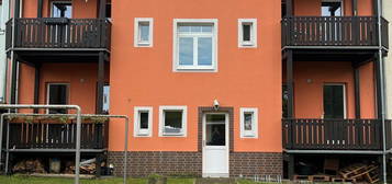 2-Raum Erdgeschosswohnung mit Balkon und Ausblick ins grüne