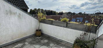 Dachgeschosswohnung mit Dachterrasse und Tiefgaragenstellplatz