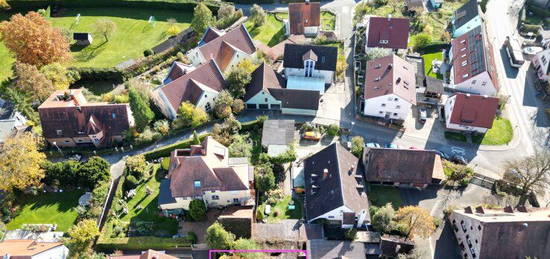 Bebautes Grundstück in Schwaig, OT Behringersdorf zum Kauf für Sanierung oder Abriss/Neubau