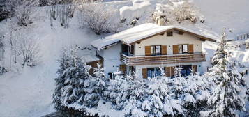 An incredibly rare mountain chalet for sale with pure 2nd home permission, set in a private, woodland location with direct ski-in / ski-out access