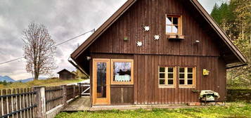 CASA IN LEGNO CON GIARDINO FRONTE PISTE DA SCI