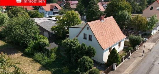 Kleines Einfamilienhaus mit tollem Garten sucht begabte Käufer!